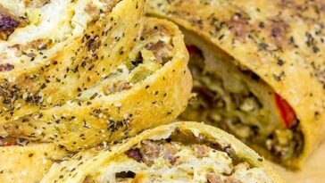 Spicy Italian Sausage Roll Filled with sausage peppers and onions Copie