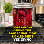 Easy homemade pickled beets in a glass jar with mustard seeds and peppercorns