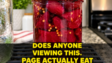 Easy homemade pickled beets in a glass jar with mustard seeds and peppercorns